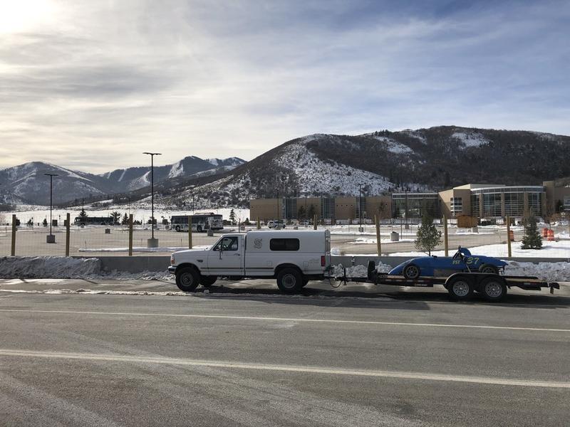 Truck, trailer and race car off I-80 somewhere East of Salt Lake City